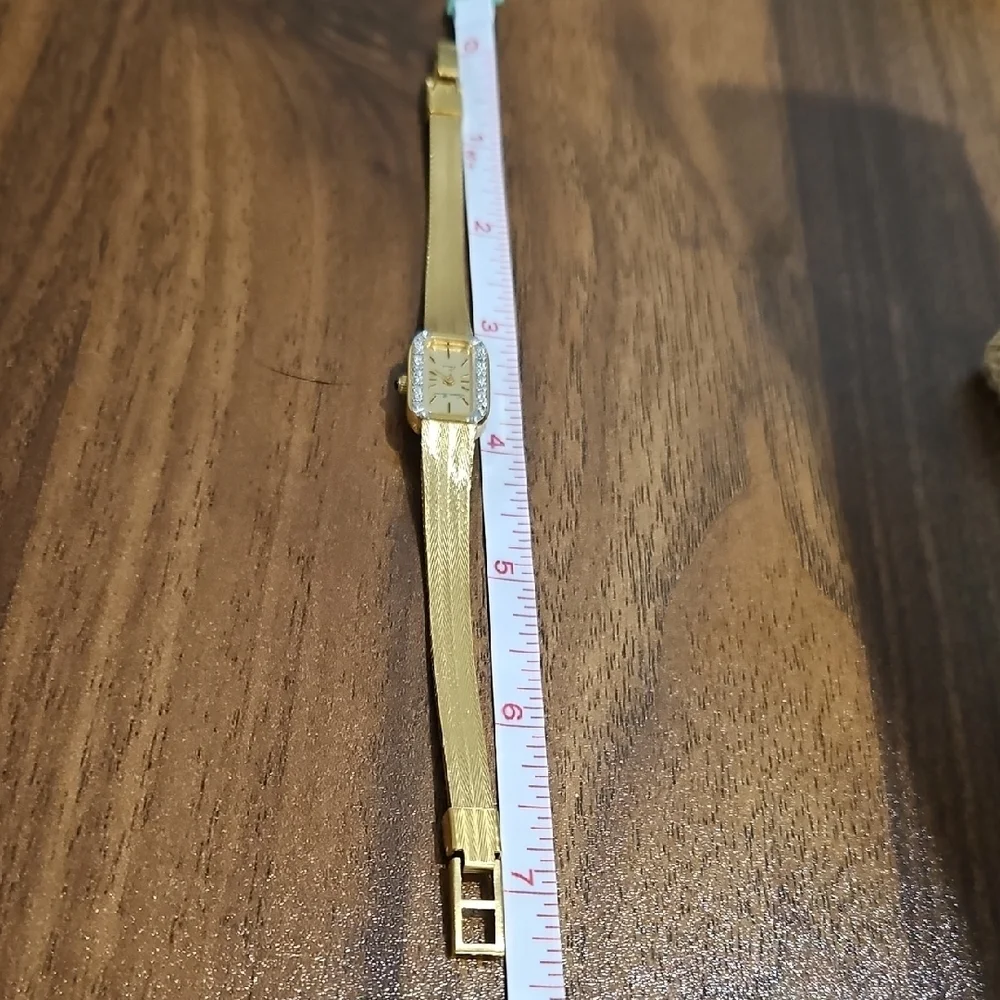Vintage Lucian Piccard Goldtone Women's Watch with Crystal Detailing